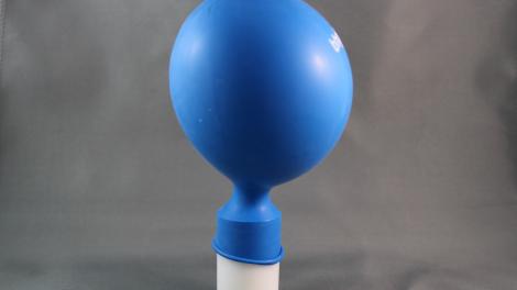 balloon on plastic canister